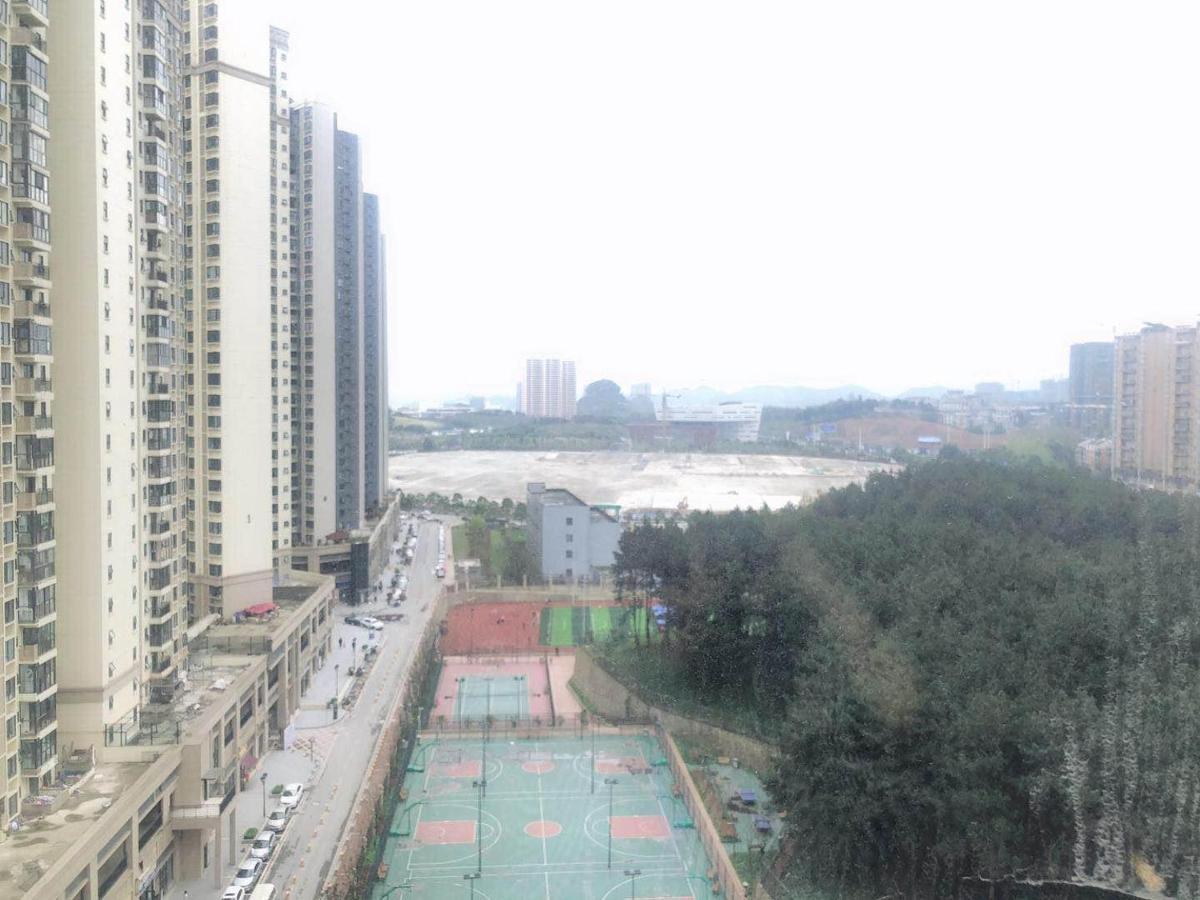 Iu Hotel Guiyang Olympic Sports Center China Resources Vientiane Екстериор снимка